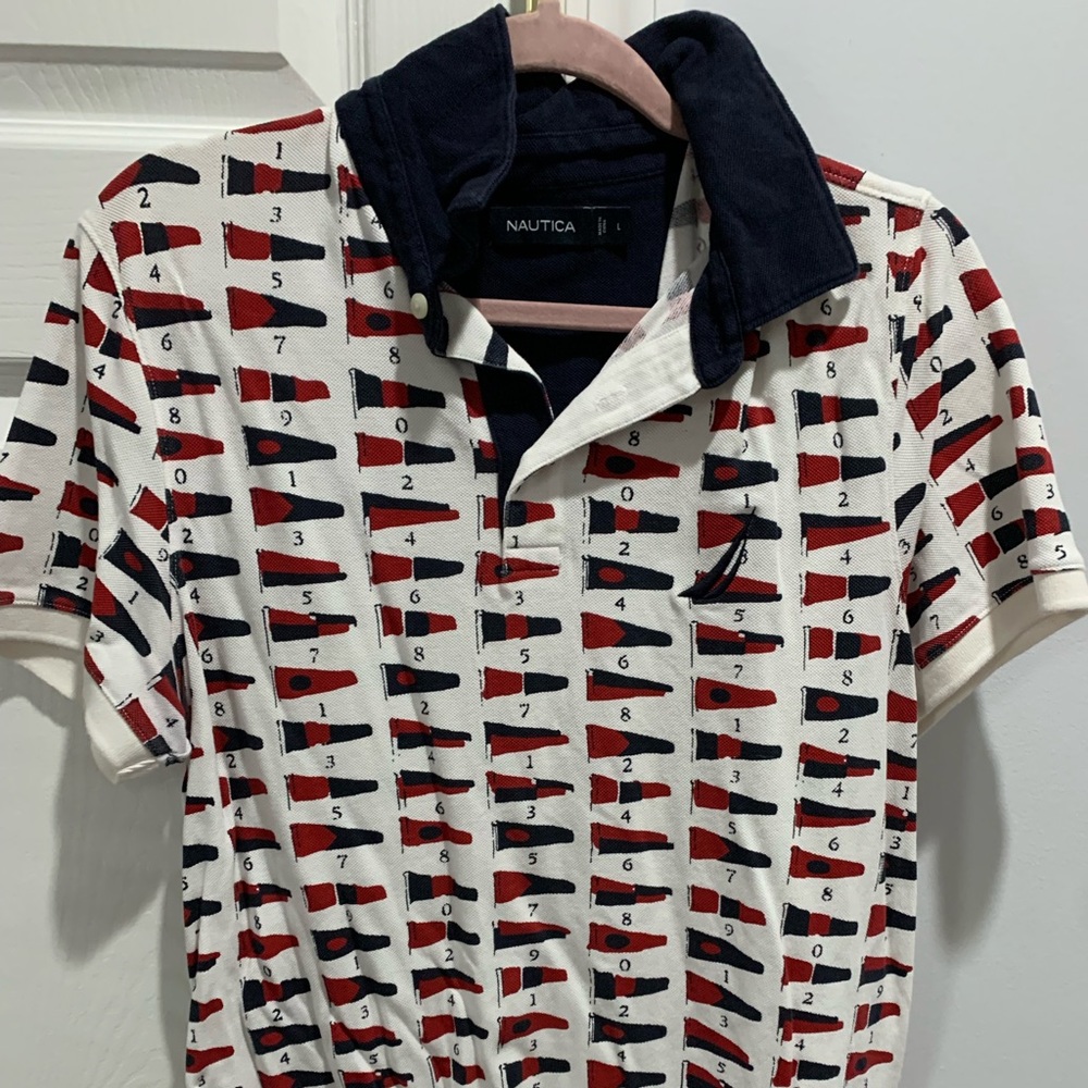 Lightly used nautica flag polo